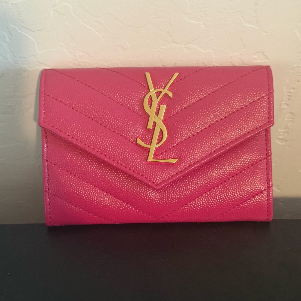 On 24HR HOLD Yves Saint Laurent wallet